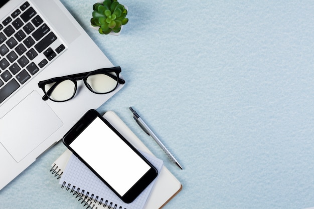 Flat lay desk concept with smartphone template