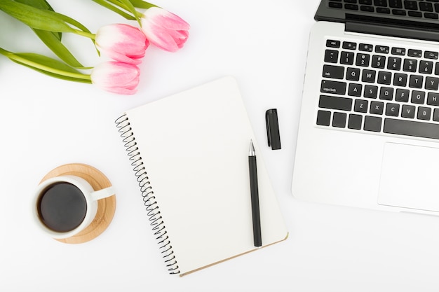 Flat lay of desk concept with tulips