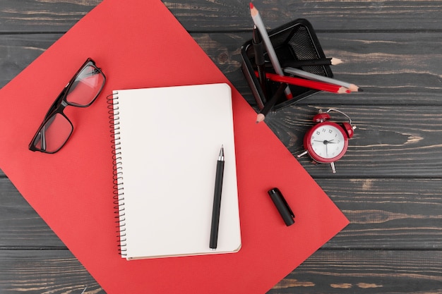 Free photo flat lay of desk concept on wooden table