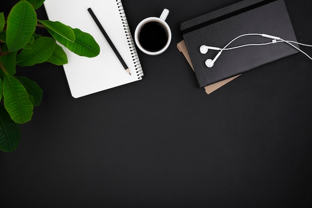 Flat lay of desk dark concept with copy space