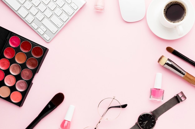 Free photo flat lay desk items on pink background