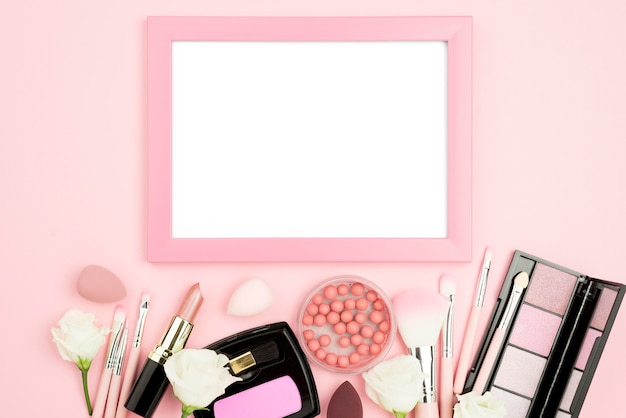 Free photo flat lay different beauty products assortment with empty frame