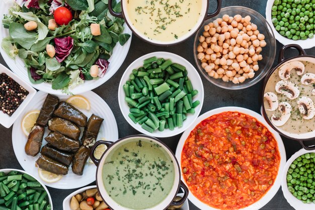 Flat lay of dishes with green beans and chickpeas