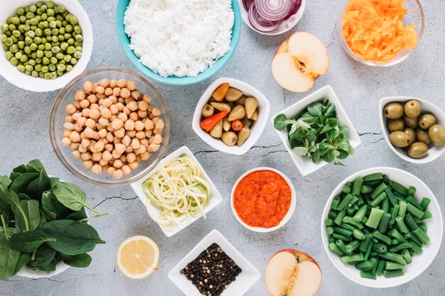 Flat lay of dishes with olives and chickpeas