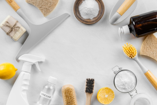 Flat lay of eco cleaning products with lemon and baking soda