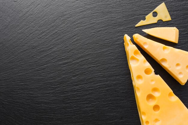 Flat lay emmental cheese with copy space