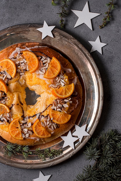 Flat lay epiphany day food with sliced oranges