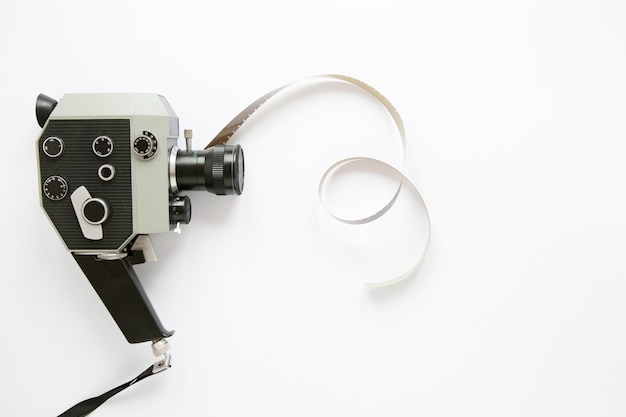 Flat lay film camera on white background