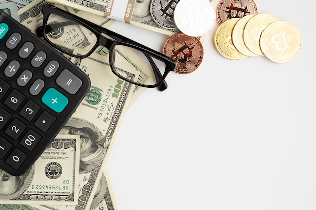 Flat lay of financial instruments with glasses