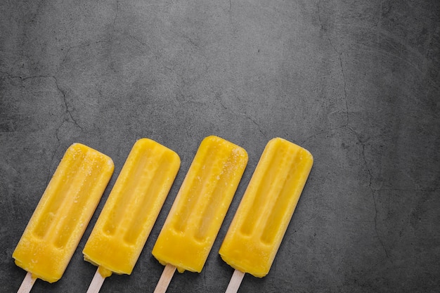 Flat lay flavored ice cream on stick