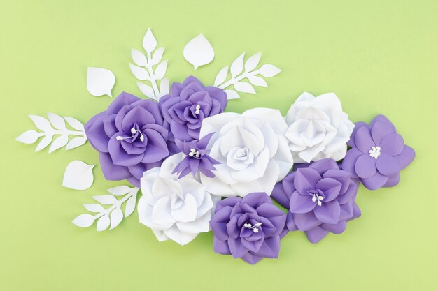 Flat lay floral arrangement on green background