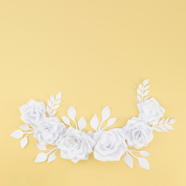 Flat lay floral assortment with yellow background