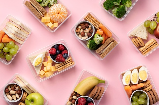 Free photo flat lay food lunch boxes arrangement