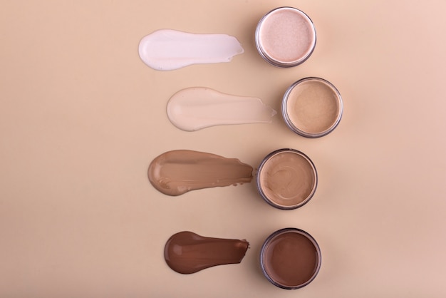 Free photo flat lay foundation containers arrangement