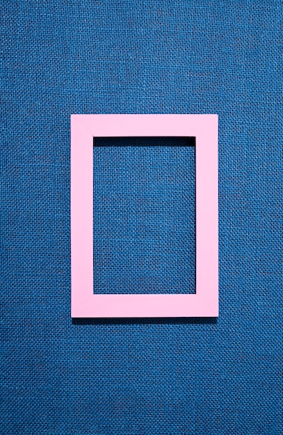 Flat lay frame on blue background