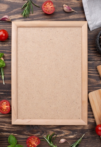 Free photo flat lay frame on table with ingredients beside