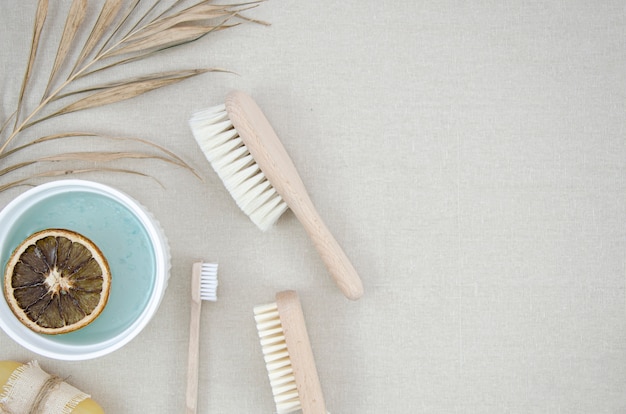 Flat lay frame with bath products and brushes