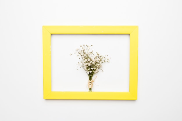 Flat lay of frame with floral concept