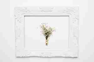 Free photo flat lay of frame with floral concept