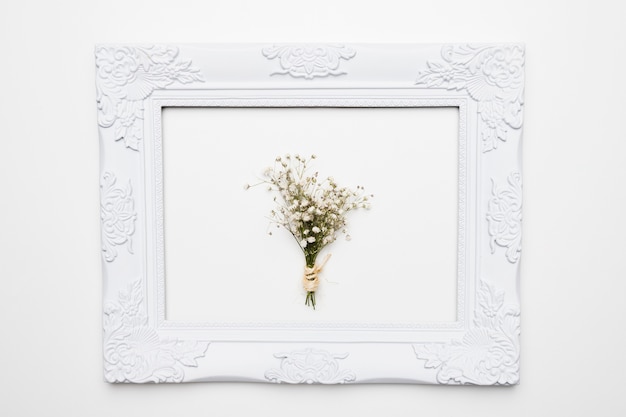 Flat lay of frame with floral concept