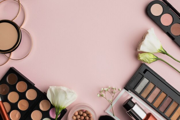 Flat lay frame with make-up products and copy-space