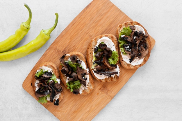 Flat lay fresh sandwiches arrangement on white background