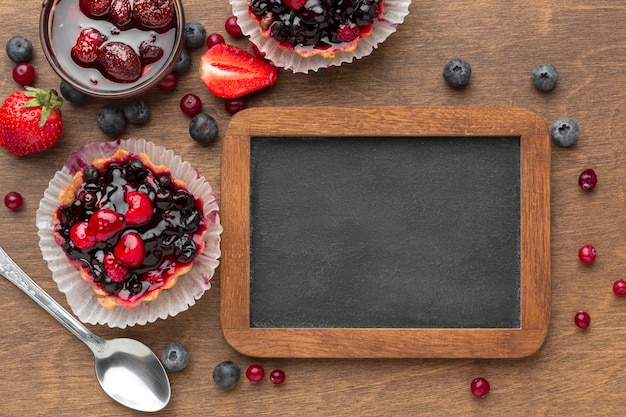 Flat lay fruit tarts arrangement