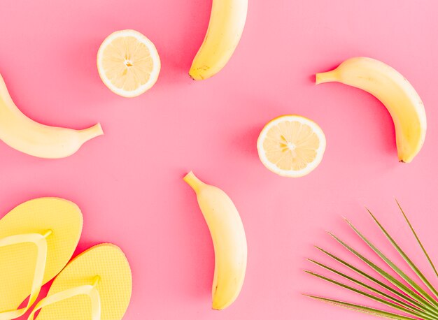 Flat lay of fruits and flip flops