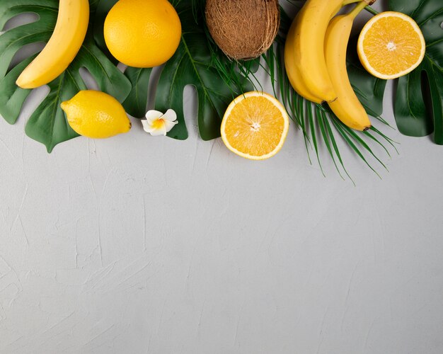 Flat lay of fruits on plain background