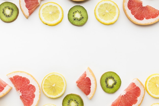 Free photo flat lay of fruits with copy space