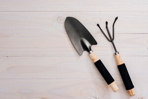 Free photo flat lay gardening tools with copy space