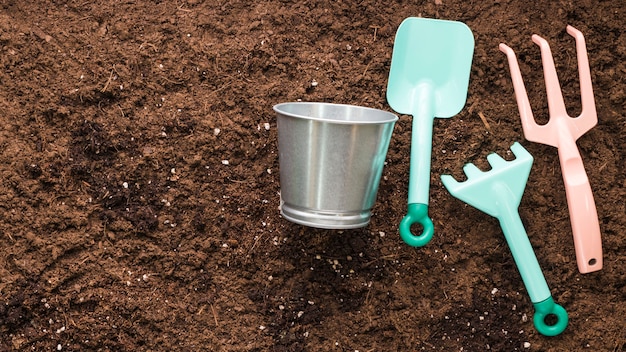 Flat lay of gardening tools with copyspace