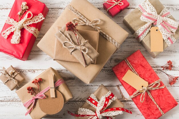 Flat lay of gift boxes on wooden background