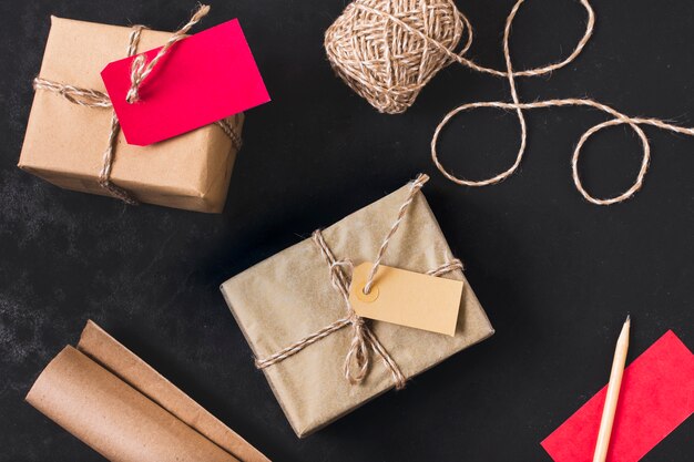 Flat lay of gifts with string and wrapping paper