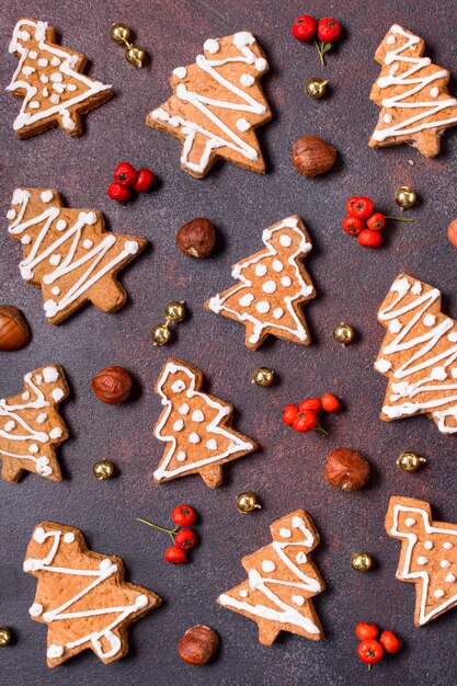 Flat lay of gingerbread cookies with red berries