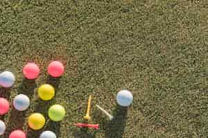 Free photo flat lay golf balls collection with copy-space