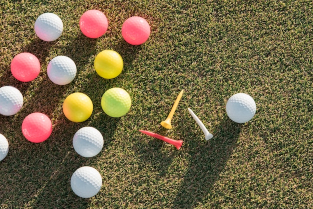 Free photo flat lay golf balls collection