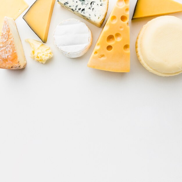 Flat lay gourmet cheese mix with copy space