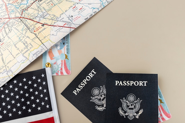Free Photo flat lay green card and passport