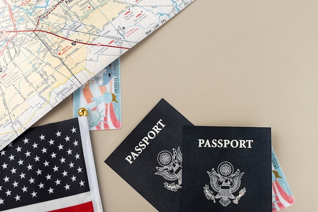 Flat lay green card and passport