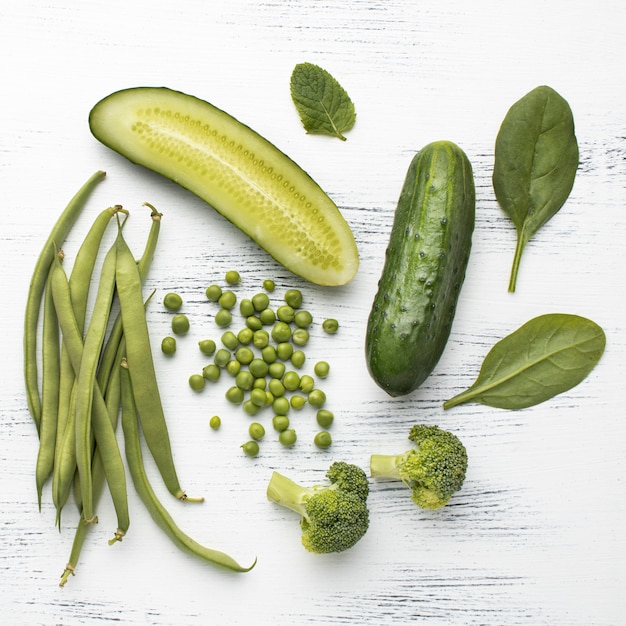 Flat lay green vegetables arrangement