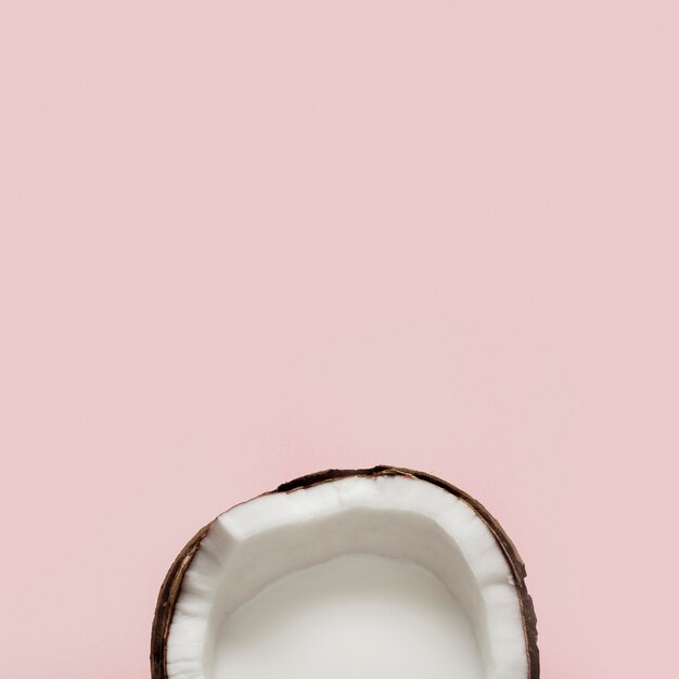 Flat lay halved coconut fruit