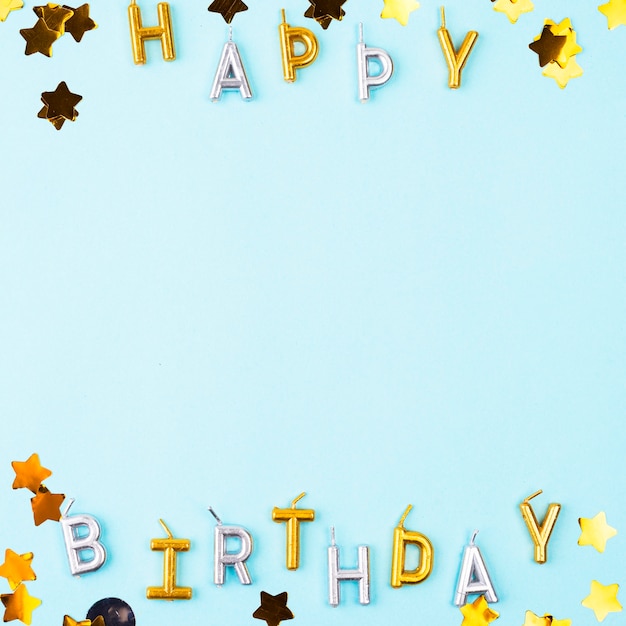 Free photo flat lay happy birthday candles frame