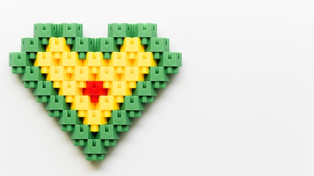 Flat lay heart shape made of lego blocks