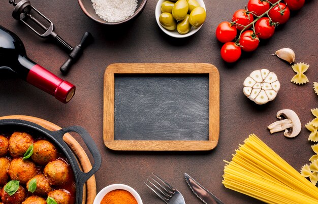 Flat lay italian food composition with slate template