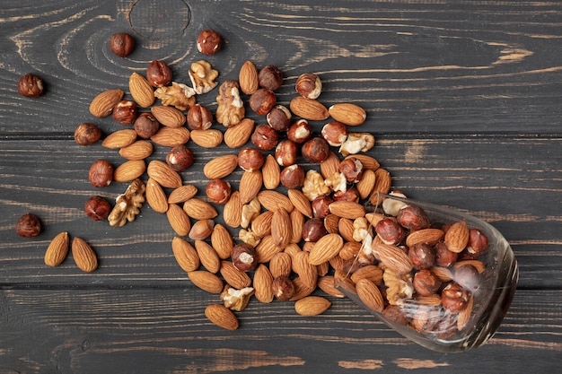 Flat lay of jar with almonds and other nuts
