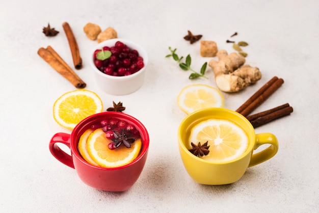 Free photo flat lay lemon tea flavor and fruits