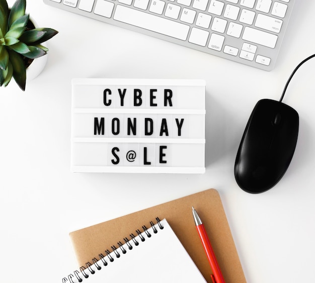 Flat lay of light box for cyber monday with keyboard and mouse