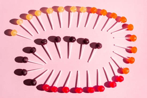 Free photo flat lay lollipops arrangement