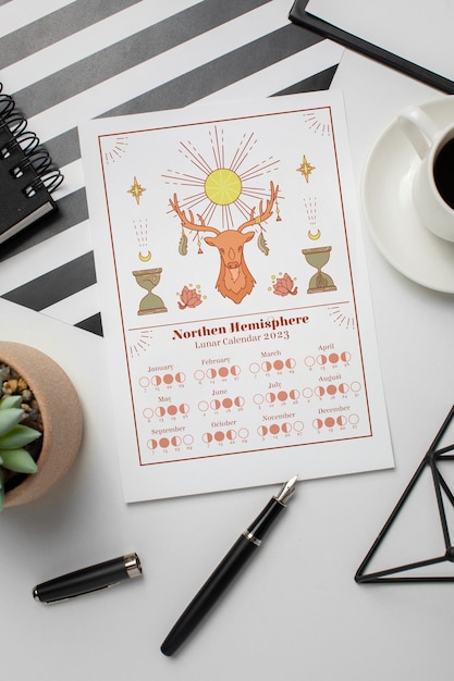 Free photo flat lay lunar calendar with deer drawing